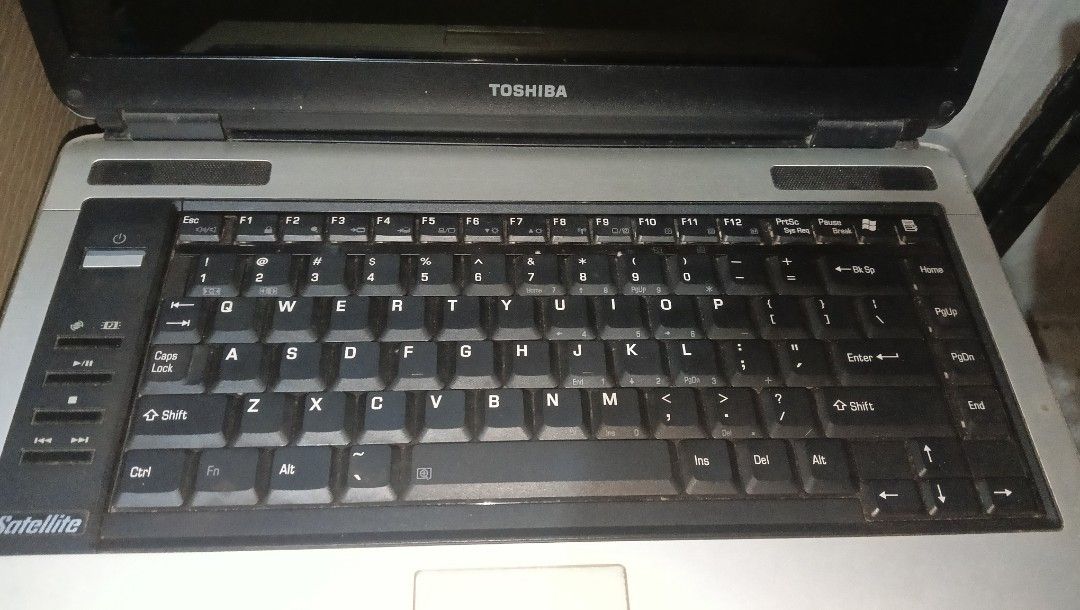 Toshiba Satellite Laptop (Category: Laptops & Notebooks) located in Magsingal. Submitted by mjviloria (Listing ID 1415895905, Image 2). Description: rfs - declutter not sure kung working pa pero working pa ito noong huling ginamit ko. nawala na yung charger..