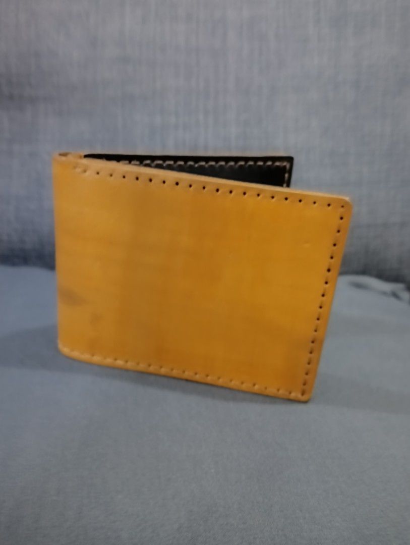 Vegetable Tanned Two Toned Genuine Leather Wallet (Category: Wallets & Card Holders) located in Hermosa. Submitted by chic2315 (Listing ID 1415848219, Image 1). Description: Brand new, never been used. Comes with a box. This is local made and handmade. Leather is made from Vegetable tanned leather. It has 6 card slots. Brand is Kalupi Leather Crafts. RFS: Too many wallets..