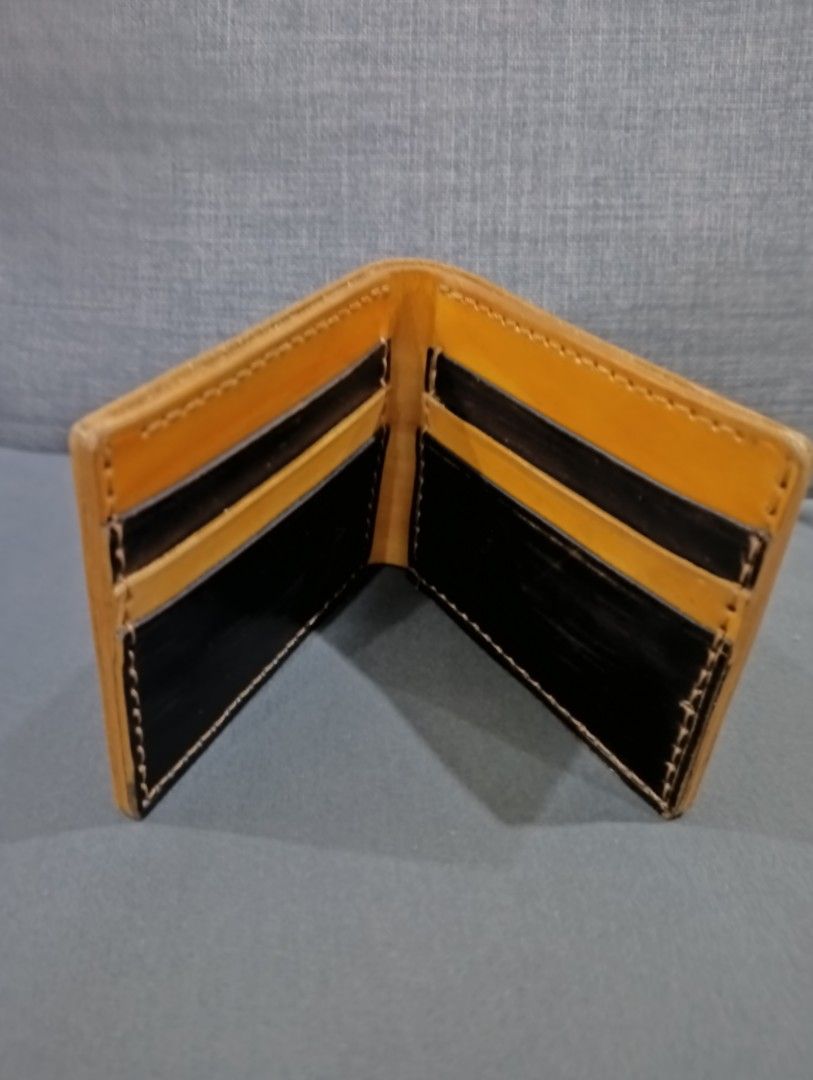 Vegetable Tanned Two Toned Genuine Leather Wallet (Category: Wallets & Card Holders) located in Hermosa. Submitted by chic2315 (Listing ID 1415848219, Image 3). Description: Brand new, never been used. Comes with a box. This is local made and handmade. Leather is made from Vegetable tanned leather. It has 6 card slots. Brand is Kalupi Leather Crafts. RFS: Too many wallets..