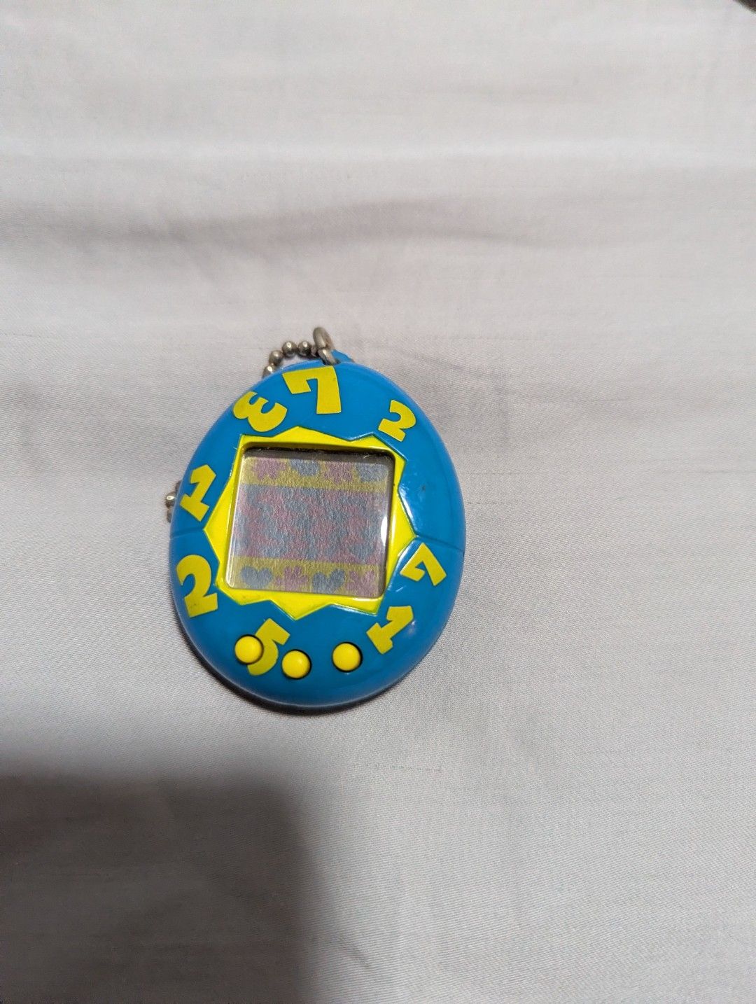 Vintage Tamagotchi Virtual Pet - Blue (Category: Others) located in Singapore. Submitted by k0nnn (Listing ID 1416004909, Image 1). Description: .