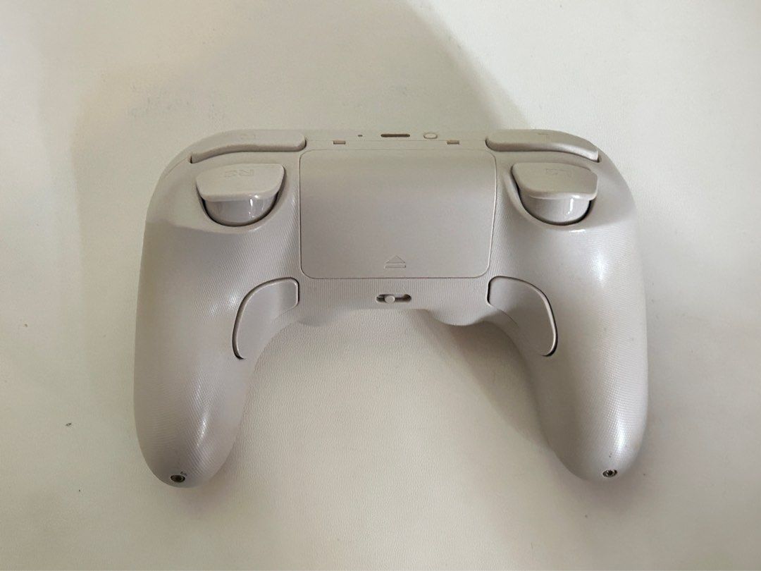8BitDo Pro 2 Game Controller (Category: Controllers) located in Bulacan. Submitted by chosaur (Listing ID 1416147084, Image 2). Description: - 8BitDo Pro 2 controller - Gray body - with stickers / kirby cover - light damage (message for pics) - with box .