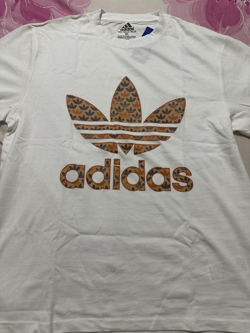 Adidas Trefoil Graphic Tee XL (Category: Tshirts & Polo Shirts ) located in Manila. Submitted by shobesclosetxx (Listing ID 1416168808, Image 2). Description: Selling for my Ahia/Brother Brand new and unused It’s still negotiable RFS: It doesn’t fit him and he doesn’t like tees with big logos.