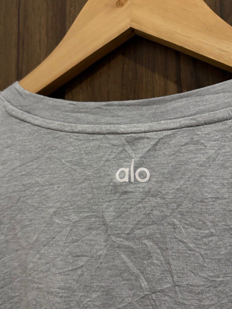 Alo Long Sleeve Shirt (Category: Activewear) located in Sagay. Submitted by saintdart6122 (Listing ID 1416206998, Image 3). Description: - Alo gray long sleeve shirt - Crew neck - Simple design - Soft, lightweight material - Alo logo on the back of the neck -repaired pinhole not noticeable .