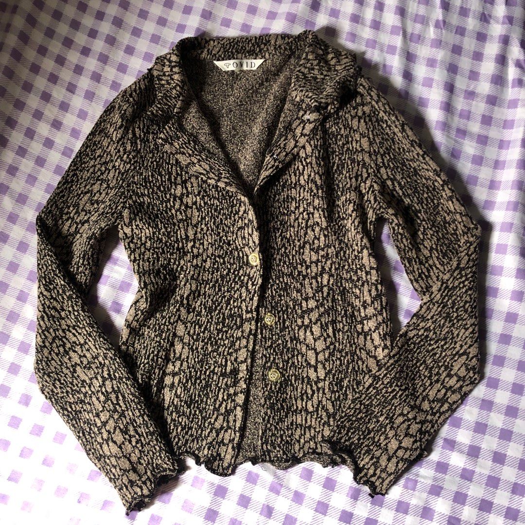 Animal Print Y2K Longsleeve Top (Category: Blouses) located in Batangas. Submitted by fairycentral (Listing ID 1416031210, Image 1). Description: - can fit up to med - flaw: missing one button (still looks good without it) - thick fabric .
