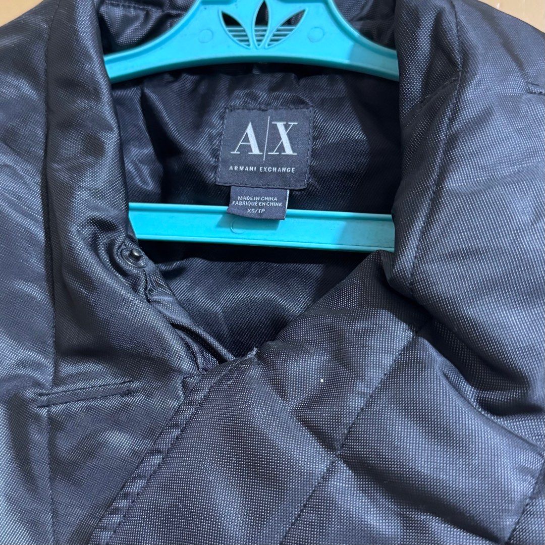 Armani Exchange AX Winter Puffer Jacket XS/P (Category: Coats, Jackets and Outerwear) located in Pasig City. Submitted by cafeverona333 (Listing ID 1416118175, Image 3). Description: - Armani Exchange puffer jacket - Belt Missing - Color: Black - Size: XS/P - Features: - Asymmetrical collar - Full-length zipper - Quilted pattern - Ribbed cuffs - No more belt included - Condition: Well-maintained With Signs of Storage Meet up in Greenbelt (T/TH) o