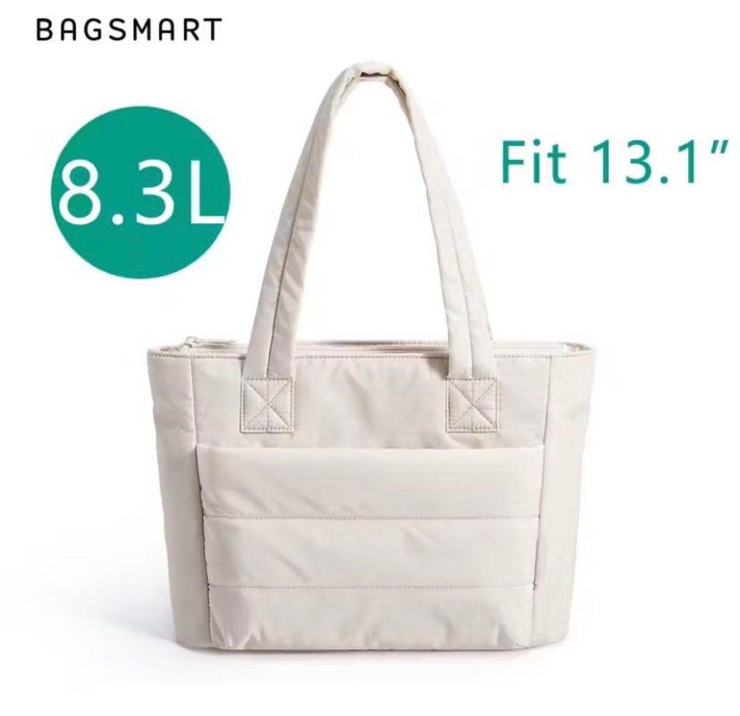 BAGSMART Padded Tote Bag (Category: Tote Bags) located in Manila. Submitted by shaievan (Listing ID 1416049333, Image 1). Description: - BAGSMART tote bag, ideal for daily use. - Padded design for comfort. - Spacious interior with multiple compartments. - Holds up to 8.3L. - Fits a 13.1" laptop. - Convenient top handle. - Front pocket for easy access. - Made of light-colored, quilted material..