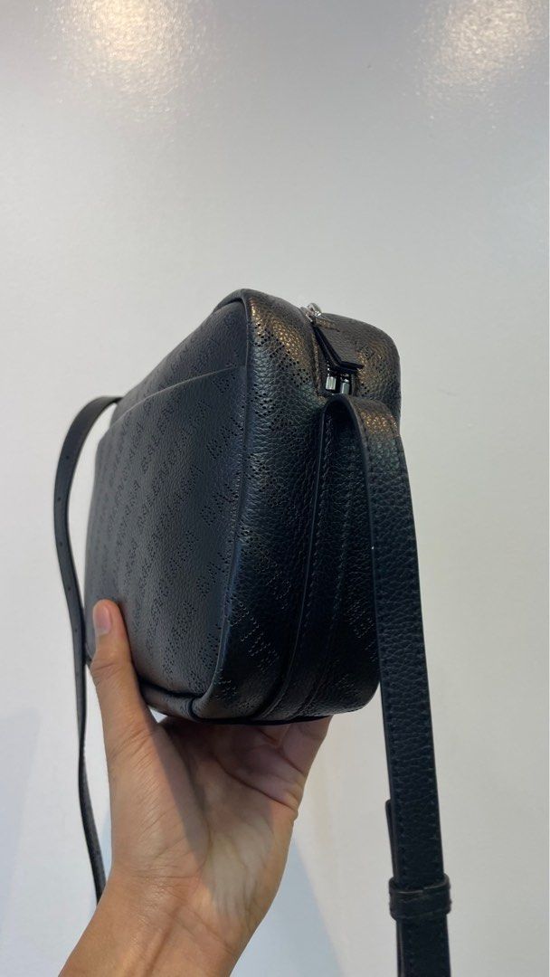BALENCIAGA Everyday Black Perforated Camera bag (Category: Luxury Bags & Wallets) located in Manila. Submitted by luxemax_09 (Listing ID 1416025015, Image 3). Description: .
