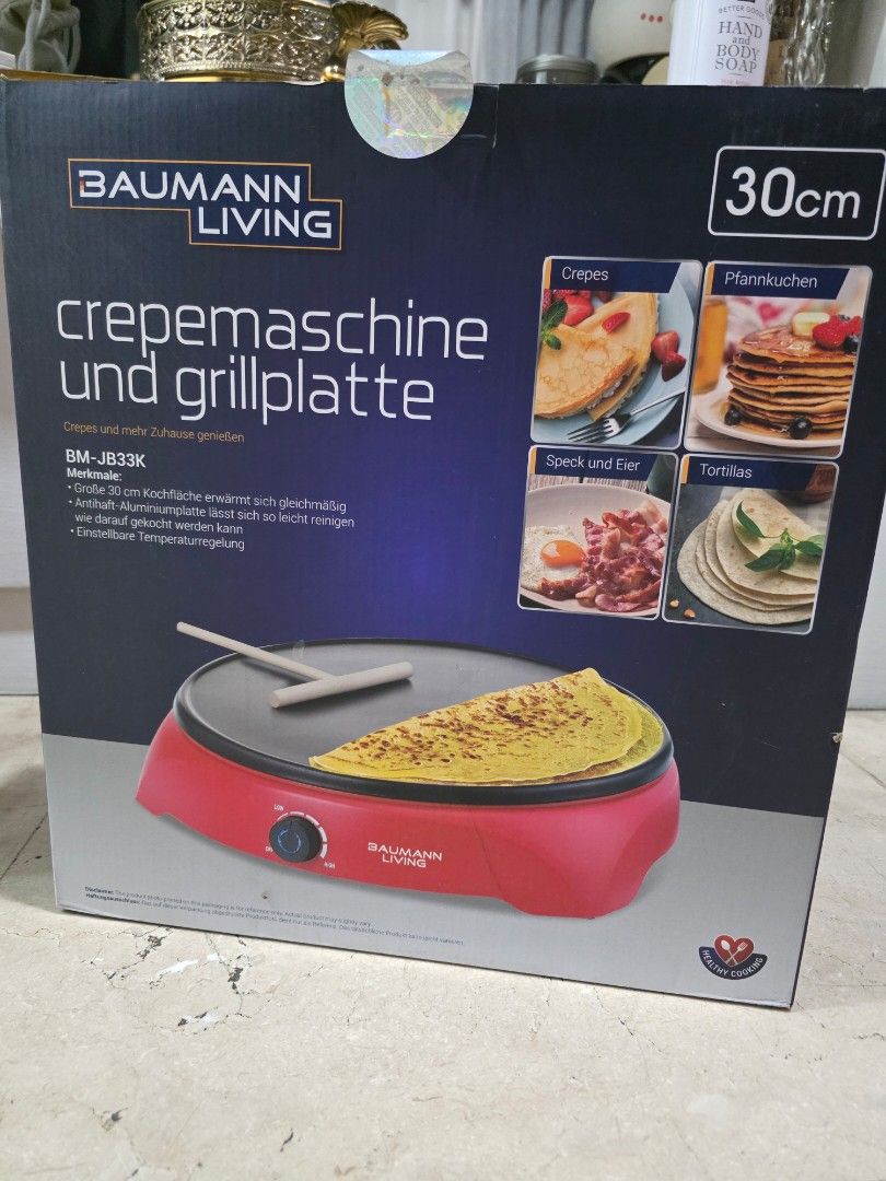 Baumann Living Crepe Maker and Griddle (Category: Cookware & Accessories) located in Quezon City. Submitted by tulipfield88 (Listing ID 1416156622, Image 1). Description: - Baumann Living crepe maker and griddle - 30cm cooking surface - Includes spreader and spatula - Easy temperature control - Model: BM-J833K - box is opened but never used.