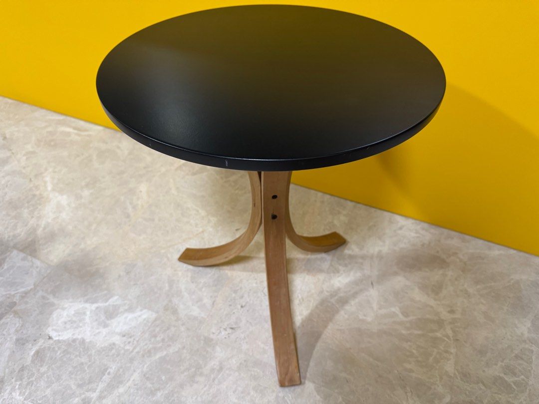 Black Round Side Table (Category: Tables & Sets) located in Singapore. Submitted by vhmlow (Listing ID 1416155708, Image 1). Description: - Stylish black round side table - Sturdy wooden base - Ideal for small spaces or as a decorative accent - Solid and functional - height (55cm), diameter of table top (45cm) - slight whitish marks - 1 for $20, 2 for $30.