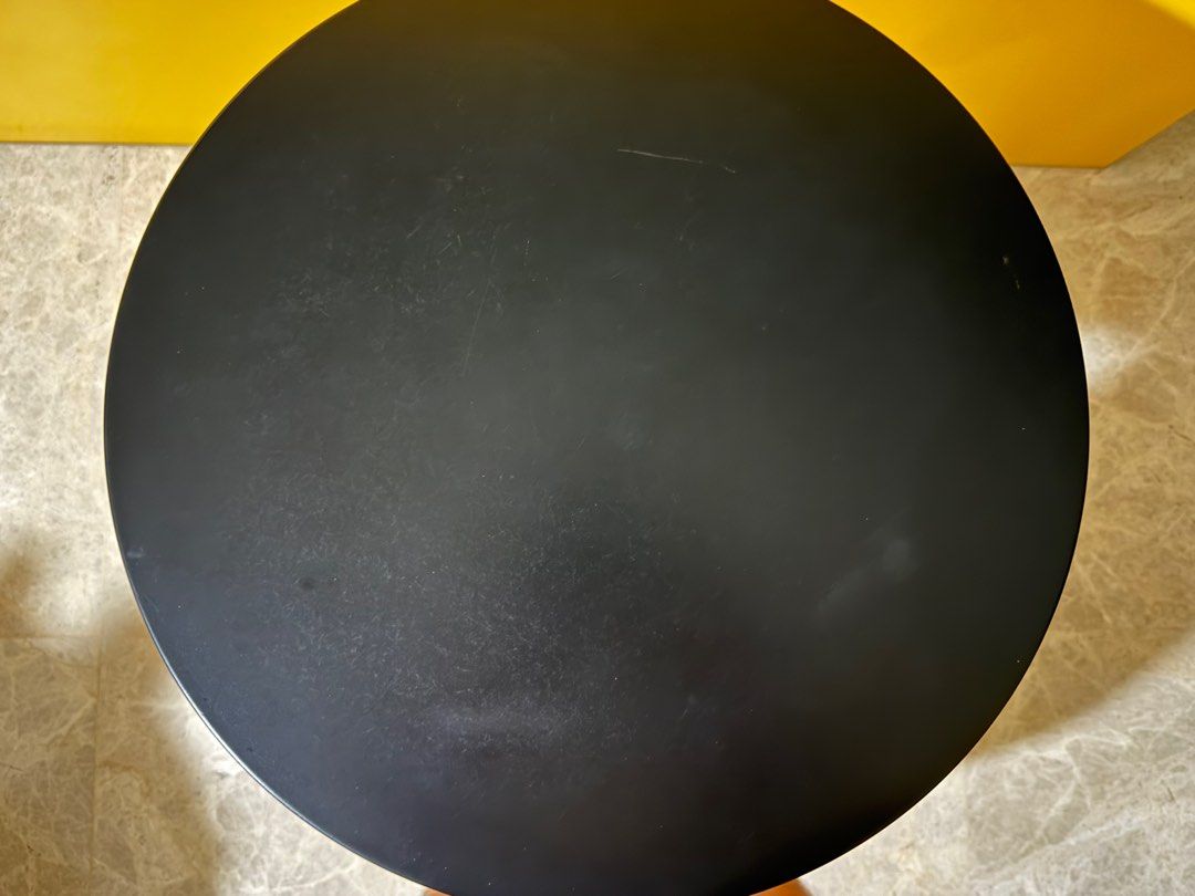 Black Round Side Table (Category: Tables & Sets) located in Singapore. Submitted by vhmlow (Listing ID 1416155708, Image 2). Description: - Stylish black round side table - Sturdy wooden base - Ideal for small spaces or as a decorative accent - Solid and functional - height (55cm), diameter of table top (45cm) - slight whitish marks - 1 for $20, 2 for $30.