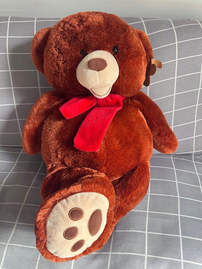 Life Size Brown Teddy Bear with Red Scarf (Category: Plushies & Soft Toys) located in Quezon City. Submitted by cranehead (Listing ID 1416067753, Image 2). Description: Well kept preloved teddy 28 inches tall 14-15 inches wide With tag Purchased from toy kingdom Negotiable .