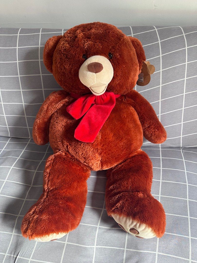 Life Size Brown Teddy Bear with Red Scarf (Category: Plushies & Soft Toys) located in Quezon City. Submitted by cranehead (Listing ID 1416067753, Image 3). Description: Well kept preloved teddy 28 inches tall 14-15 inches wide With tag Purchased from toy kingdom Negotiable .