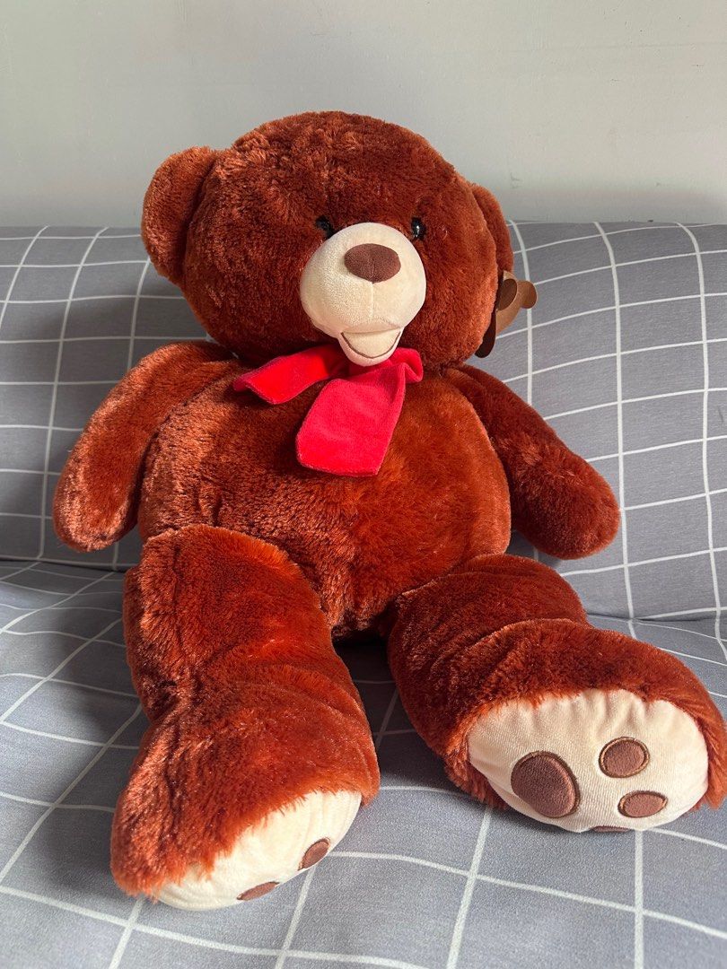 Life Size Brown Teddy Bear with Red Scarf (Category: Plushies & Soft Toys) located in Quezon City. Submitted by cranehead (Listing ID 1416067753, Image 1). Description: Well kept preloved teddy 28 inches tall 14-15 inches wide With tag Purchased from toy kingdom Negotiable .