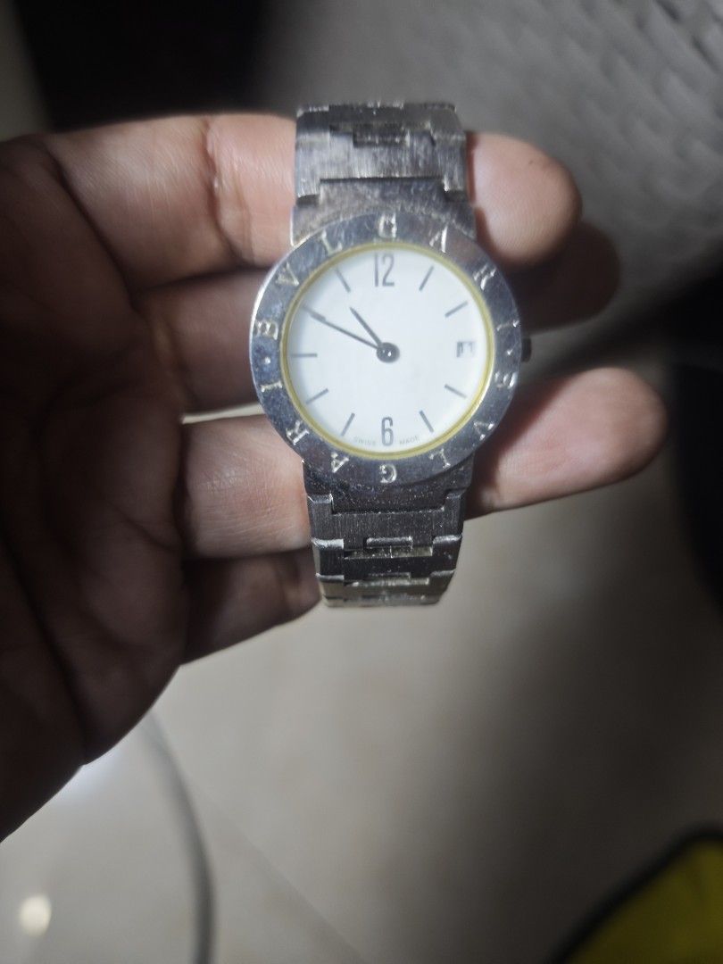 Bvlgari Quartz Watch (Category: Luxury Watches) located in Taguig. Submitted by wear.us.ph (Listing ID 1416195209, Image 1). Description: - Authentic Bvlgari quartz watch - White dial with silver-tone hands and hour markers - Engraved Bvlgari logo on bezel - Stainless steel bracelet - Model: BB 23 GL - Swiss-made NO BATTERY .