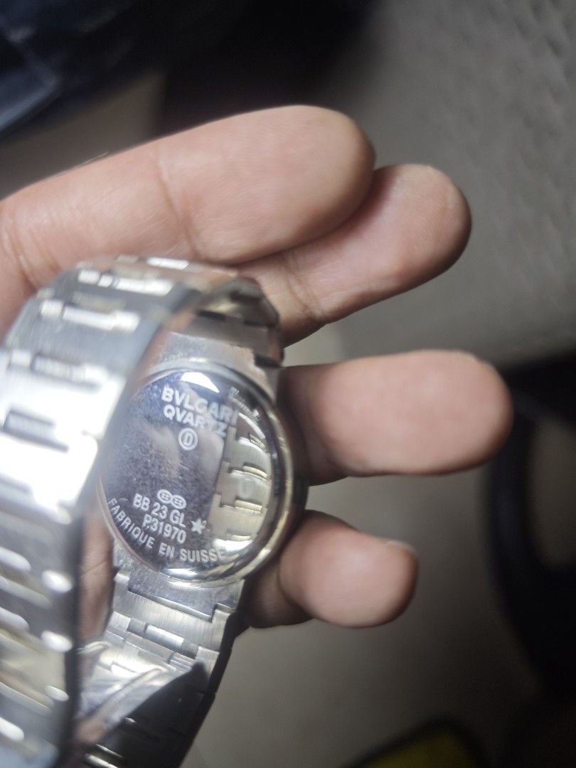 Bvlgari Quartz Watch (Category: Luxury Watches) located in Taguig. Submitted by wear.us.ph (Listing ID 1416195209, Image 3). Description: - Authentic Bvlgari quartz watch - White dial with silver-tone hands and hour markers - Engraved Bvlgari logo on bezel - Stainless steel bracelet - Model: BB 23 GL - Swiss-made NO BATTERY .