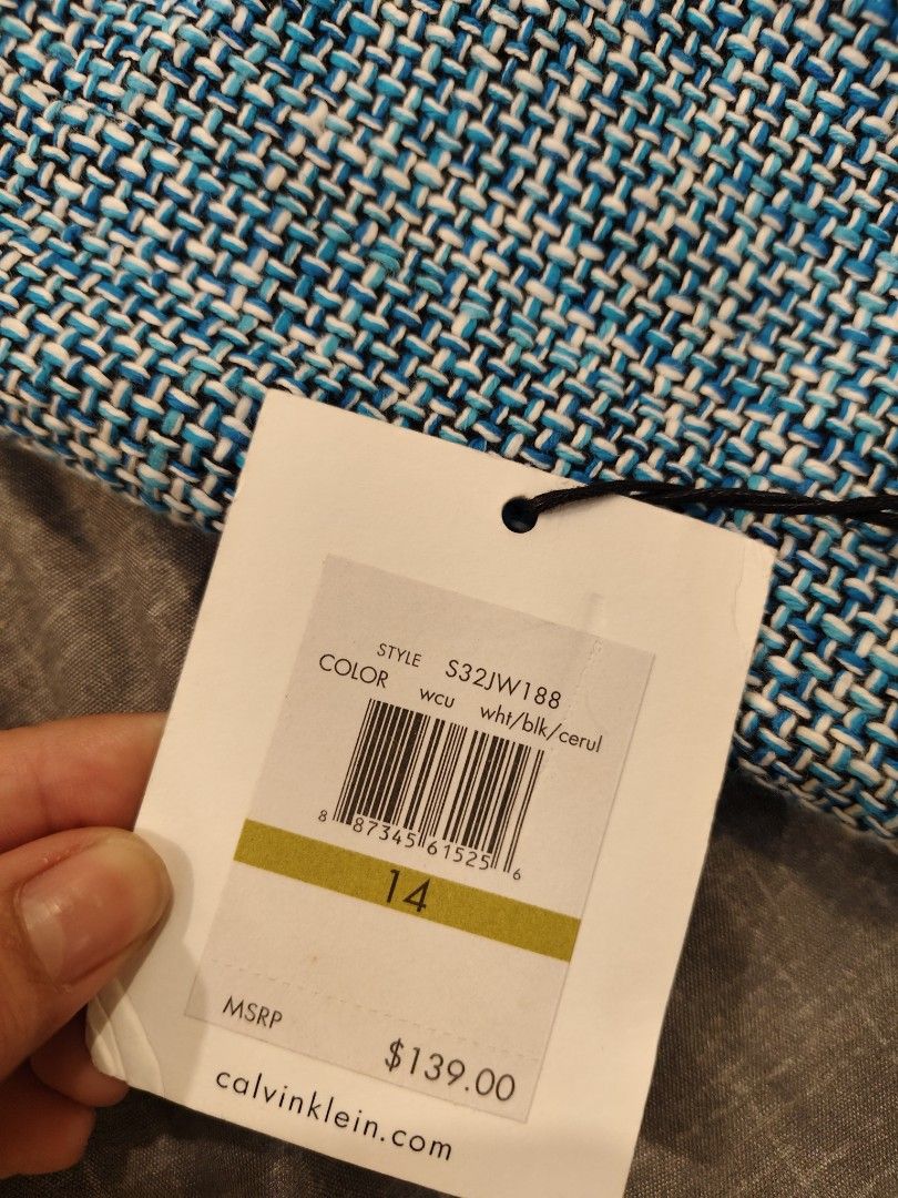 Calvin Klein Blue Tweed Blazer Size 14 (Category: Coats, Jackets and Outerwear) located in Bacolod City. Submitted by mamix (Listing ID 1416097860, Image 2). Description: - Calvin Klein blazer - Vibrant blue tweed - Size 14 - Classic two-button design - Flattering fit - High-quality materials - Perfect for a sophisticated look - Original price: "$139.00".