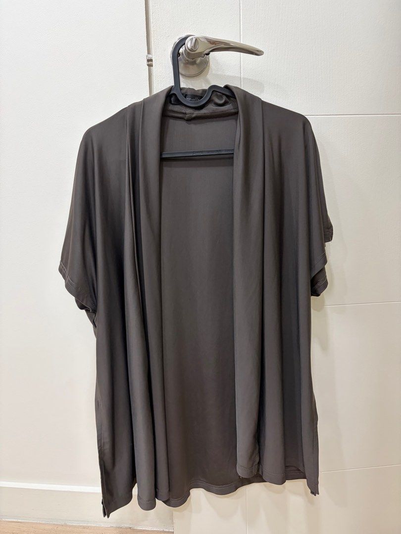 Dark Gray Cardigan (Category: Coats, Jackets and Outerwear) located in Pasig City. Submitted by sheencf (Listing ID 1416145907, Image 1). Description: - Dark gray cardigan - Short sleeves - Draped front - Lightweight fabric - Relaxed fit - Versatile design 🛍️RFS: decluttering 💵 MOP: Gcash or BPI online bank transfer 💬PM me if you are interested 🚀Shipping available at buyer’s expense 📍Pasig City.