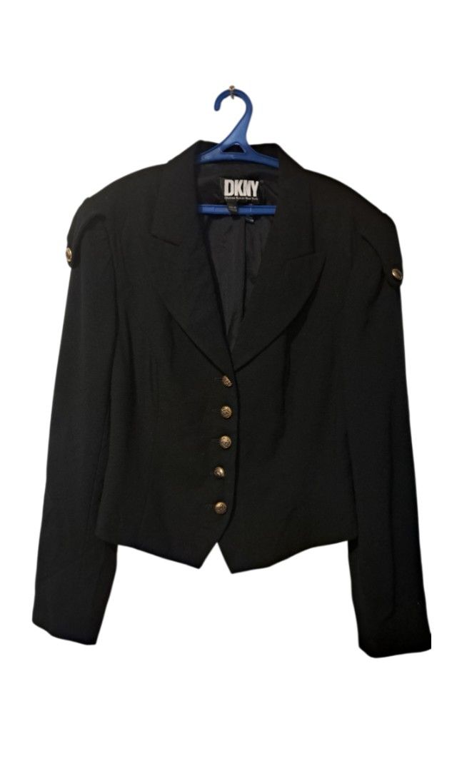DKNY Black Cropped Blazer Jacket with Gold Buttons (Category: Coats, Jackets and Outerwear) located in Cavite. Submitted by naning049 (Listing ID 1416146454, Image 1). Description: - DKNY black blazer - Features gold buttons - Made in Hong Kong - Material: Wool and rayon blend - Classic design - Tailored fit - Suitable for various occasions lightly used. Size 6 on tag. Chest- 36" Length drop- 22" No flaws..