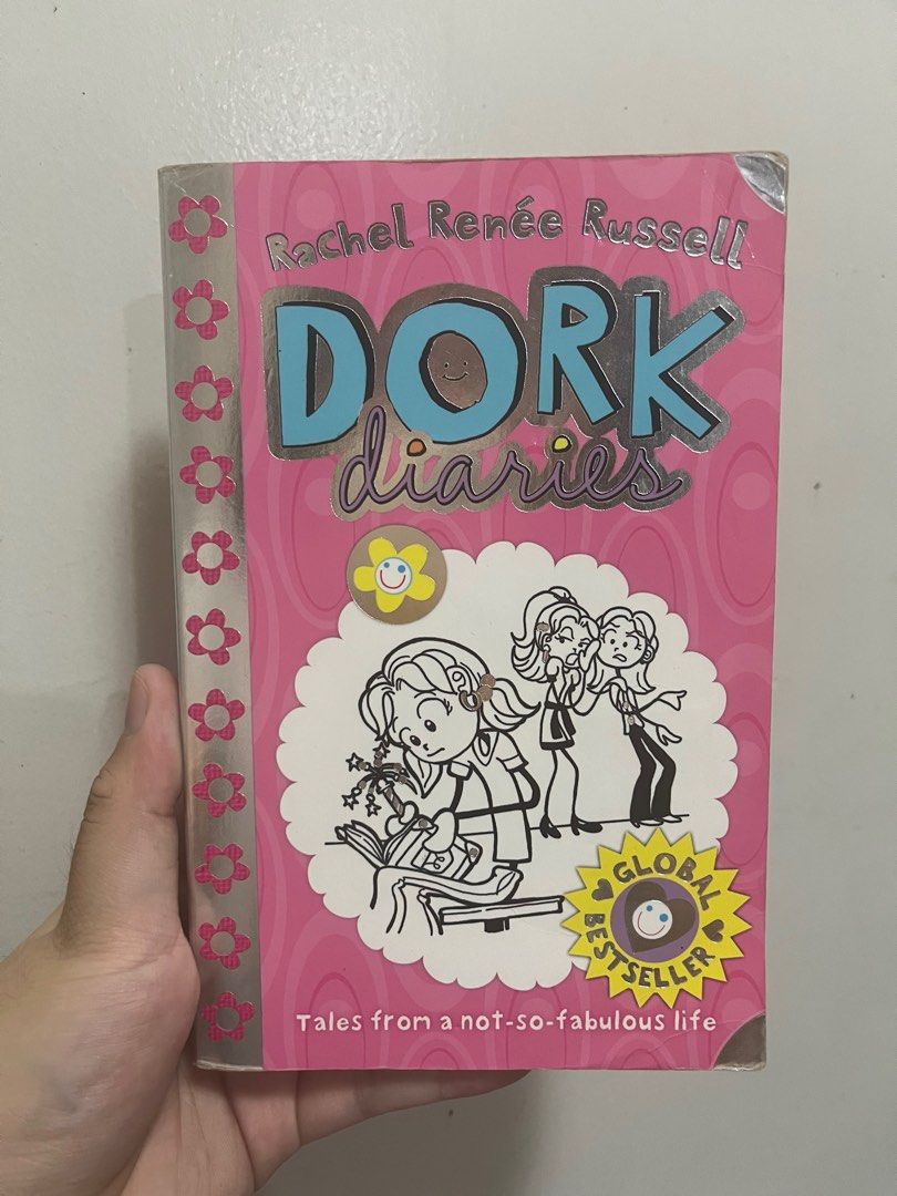 Dork Diaries Book (Category: Children's Books) located in Las Pinas. Submitted by pbmdoog (Listing ID 1416068352, Image 3). Description: - Dork Diaries book set by Rachel Renée Russell. - Includes "Drama Queen", "Frenemies Forever", and one more book. - Part of the "Tales from a not-so-fabulous life" series. - Ideal for young readers..