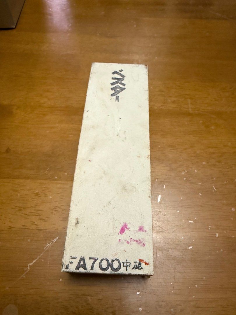 FA700 Japanese Whetstone (Category: Knives & Chopping Boards) located in Pilar. Submitted by faveanyshop (Listing ID 1416118221, Image 1). Description: - Authentic Japanese whetstone - Features "FA700" markings and Japanese characters - Rectangular shape - White color with some discoloration -restore/maintain blade sharpness - Perfect for sharpening knives and tools.