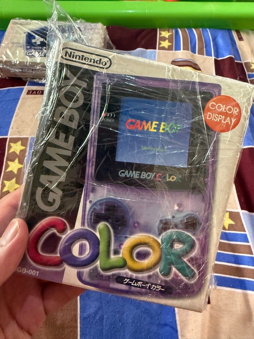 Gameboy Color purple (Category: Nintendo) located in Valenzuela. Submitted by gamerboy19 (Listing ID 1416214029, Image 1). Description: Like new Condition Box 99% condi new screen 99%smooth no issue.