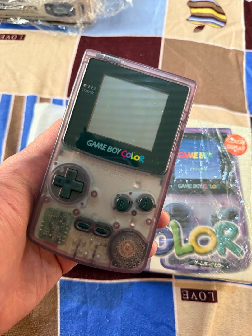Gameboy Color purple (Category: Nintendo) located in Valenzuela. Submitted by gamerboy19 (Listing ID 1416214029, Image 2). Description: Like new Condition Box 99% condi new screen 99%smooth no issue.