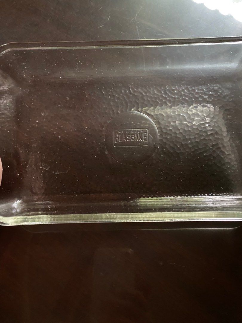 Glassbake Rectangular Baking Dish (Category: Bakeware) located in Pasig City. Submitted by ecochicsales (Listing ID 1416026343, Image 2). Description: - Glassbake rectangular baking dish - Made of clear glass - Textured bottom surface - Standard baking size - Glassbake logo present.