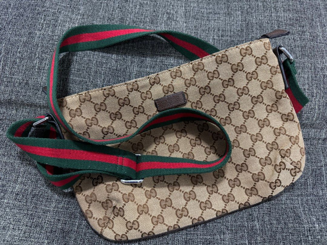 Gucci GG Canvas Sling Bag (Category: Luxury Bags & Wallets) located in Paranaque City. Submitted by icecollant20922 (Listing ID 1416215299, Image 1). Description: Gucci Sherry Line Canvas Sling / Shoulder Bag Good condition Issue : right side natastas yung tahi ng sling but pede patahi NGA .