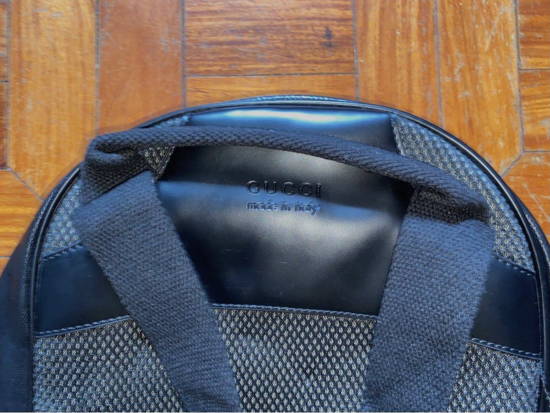 Gucci GG Pattern Backpack (Category: Luxury Bags & Wallets) located in Quezon City. Submitted by kurtdeduyo (Listing ID 1416100796, Image 3). Description: - Authentic Gucci backpack - Iconic GG pattern - Color: Black - Made in Italy - Features: - Zip closure - Front pocket - Adjustable shoulder straps - Silver-toned hardware - Interior: Brown lining with Gucci label RFS: Gift only, Decluttering.
