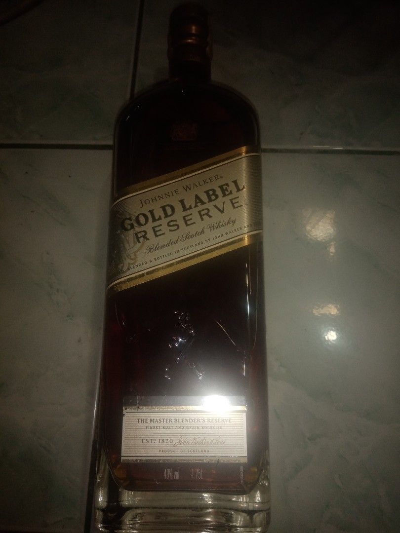 Johnnie Walker Gold Label Reserve 1.75L (Category: Beverages) located in Marikina City. Submitted by rjhay251210 (Listing ID 1416051641, Image 3). Description: Johnnie Walker Gold Label Reserve blended Scotch whisky. The bottle has a gold label and a gold cap. It is a 1.75L bottle. The label says "The Master Blender's Reserve". The alcohol content is 40% ABV..