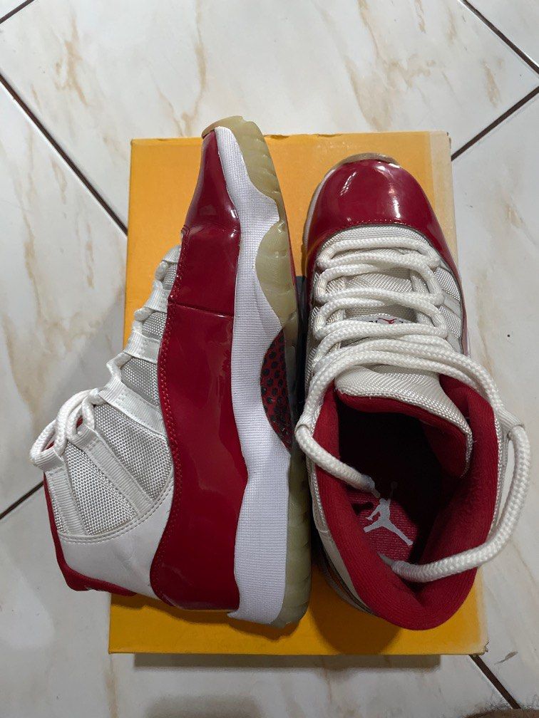 Jordan 11 Cherry (Category: Sneakers) located in Quezon City. Submitted by migel_vedra (Listing ID 1416043170, Image 3). Description: Well used but still playable condition. Bought 3 years ago. Guaranteed authentic. Slight yellowing of soles. Only issue is toebox glue coming off a bit kindly check pics. Open for offers. Buyer to shoulder delivery thanks!.