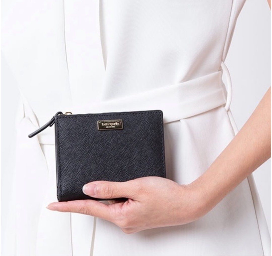 Kate Spade Wallet (Category: Luxury Bags & Wallets) located in Pasay City. Submitted by rains_preloved (Listing ID 1416157020, Image 2). Description: pm for actual pic.
