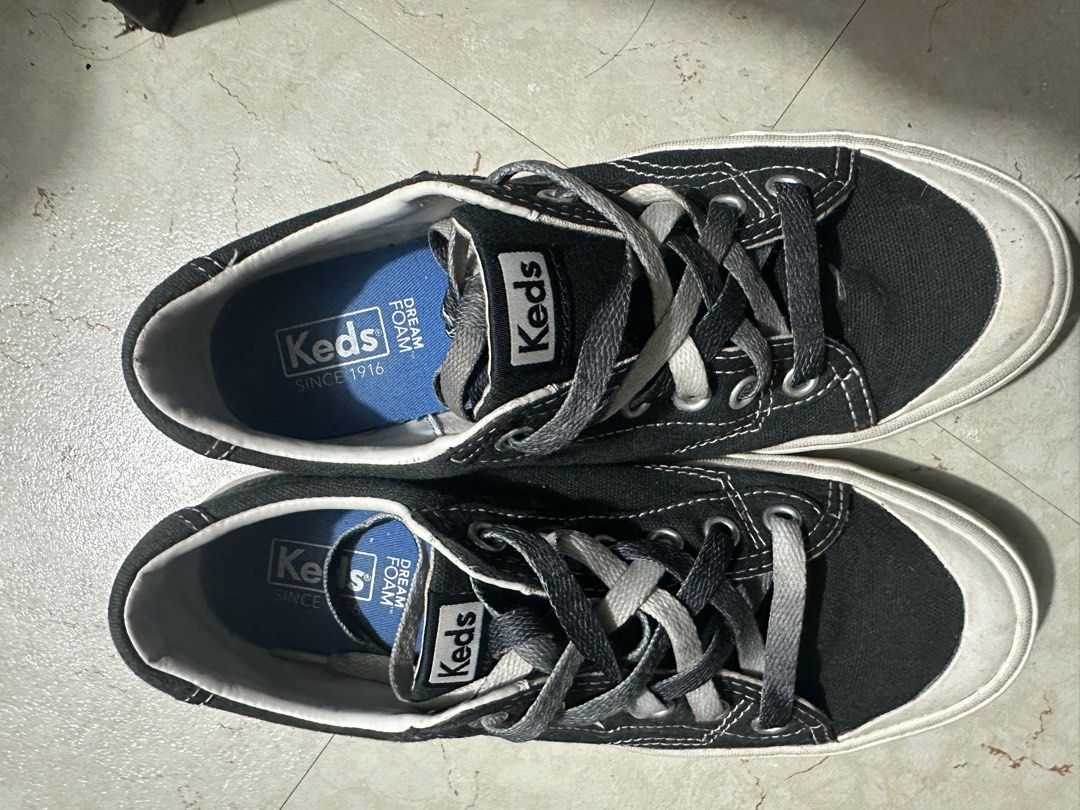 Keds Black Canvas Sneakers (Category: Sneakers) located in Makati City. Submitted by ceeunever (Listing ID 1416118902, Image 2). Description: - Black Keds canvas sneakers - US size 7, UK 4.5, EUR 37.5, CN 24 - White rubber sole - Lace-up closure - Dream Foam insoles - Keds logo on heel and tongue - No issues just need cleaning.
