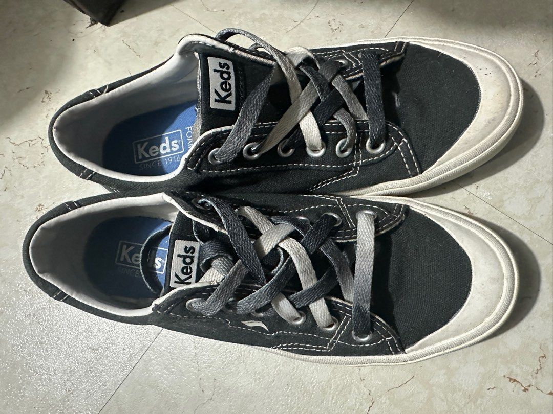 Keds Black Canvas Sneakers (Category: Sneakers) located in Makati City. Submitted by ceeunever (Listing ID 1416118902, Image 1). Description: - Black Keds canvas sneakers - US size 7, UK 4.5, EUR 37.5, CN 24 - White rubber sole - Lace-up closure - Dream Foam insoles - Keds logo on heel and tongue - No issues just need cleaning.