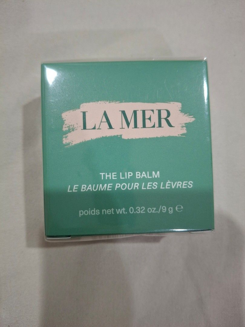 La Mer The Lip Balm 9g (Category: Face Care) located in Manila. Submitted by mamanilala (Listing ID 1416093346, Image 1). Description: La Mer The Lip Balm 9g Brand New, with box SRP PHP 3950 This velveteen balm with a hint of mint calms, restores and conditions, transforming lips with the most tender touch. Instantly helping to soften dryness, this emollient treatment nourishes, restores and strengthens the natural moisture barrier to help preven