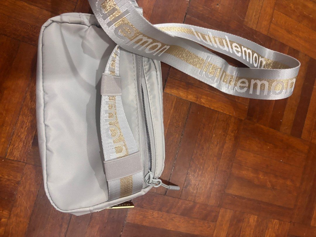 Lululemon Everywhere Belt Bag (Category: Cross-body Bags) located in Cebu City. Submitted by makeupdontbreakup (Listing ID 1416172024, Image 2). Description: - Lululemon Everywhere Belt Bag - Color: Light Gray - Matching strap with Lululemon logo - Zipper closure - Sleek and stylish design - Ideal for everyday use and carrying essentials Rfs: i have 4 of these.