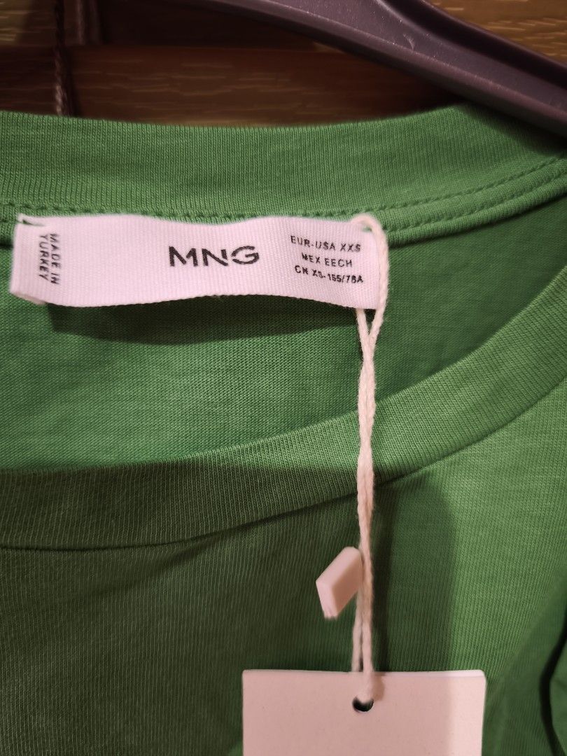 Mango Green Ruffle Sleeve T-shirt (Category: Shirts) located in Las Pinas. Submitted by modelmama (Listing ID 1416158832, Image 3). Description: - Mango t-shirt - Vibrant green color - Stylish ruffle sleeves - Round neckline - Comfortable fabric - Size XXS - New with tags ***STRICTLY NO HAGGLING! Prices are at their lowest already. We will not entertain nor reply to lower offers*** We accept GCASH. Ship via J&T or book your own lalamove / Grab dr