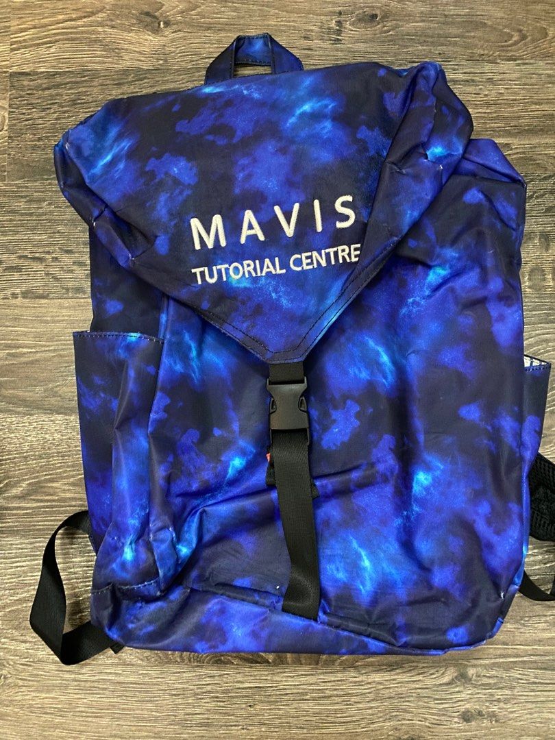 Mavis Tutorial Centre Backpack Blue (Category: Backpacks) located in Singapore. Submitted by starrychar (Listing ID 1416201052, Image 1). Description: no stains as shown in pictures - Vibrant blue and white design - Drawstring and buckle closure - Striped interior lining - Side pockets - Adjustable straps - Suitable for school and everyday use.