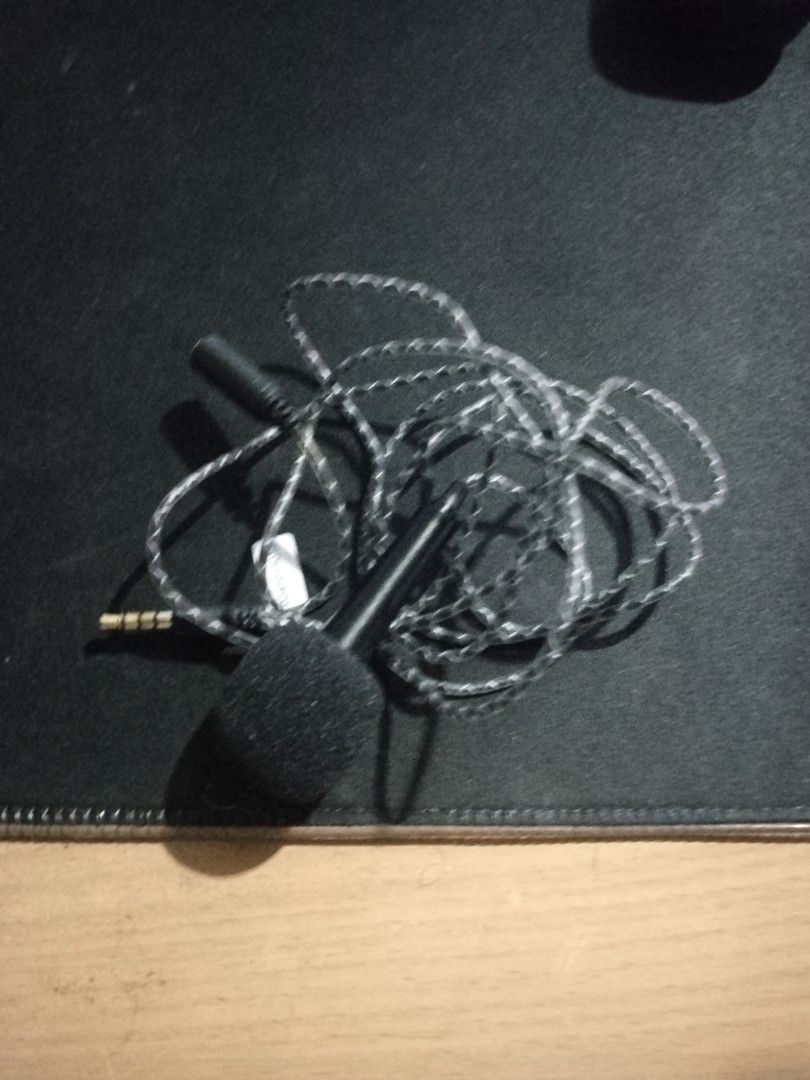 Miniature Microphone with Stand (Category: Microphones) located in Mandaluyong City. Submitted by eyji569 (Listing ID 1416117524, Image 1). Description: - Miniature microphone with stand - Black foam cover - Silver and black braided cable - 3.5mm jack - Black, square stand.