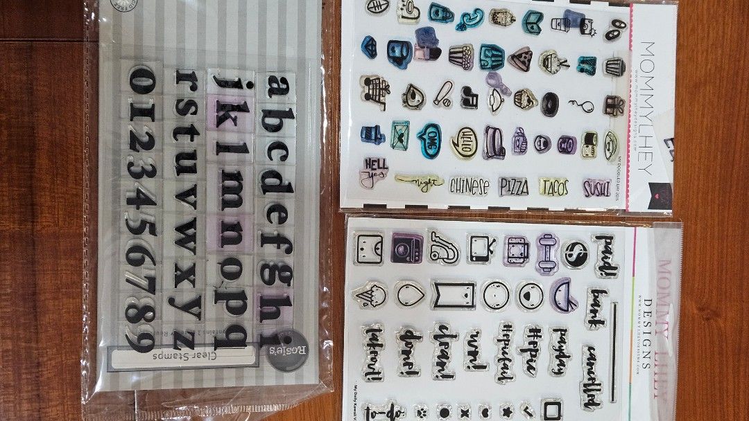 Mommy Lhey Designs & Basic Grey Clear Stamps (Category: Craft Supplies & Tools) located in Quezon City. Submitted by brigdog (Listing ID 1416067498, Image 2). Description: - Used stamp set - From Mommy Lhey Designs and Rosie's - Includes alphabet, numbers, icons, and words - Perfect for journaling and scrapbooking - Still in original packaging.