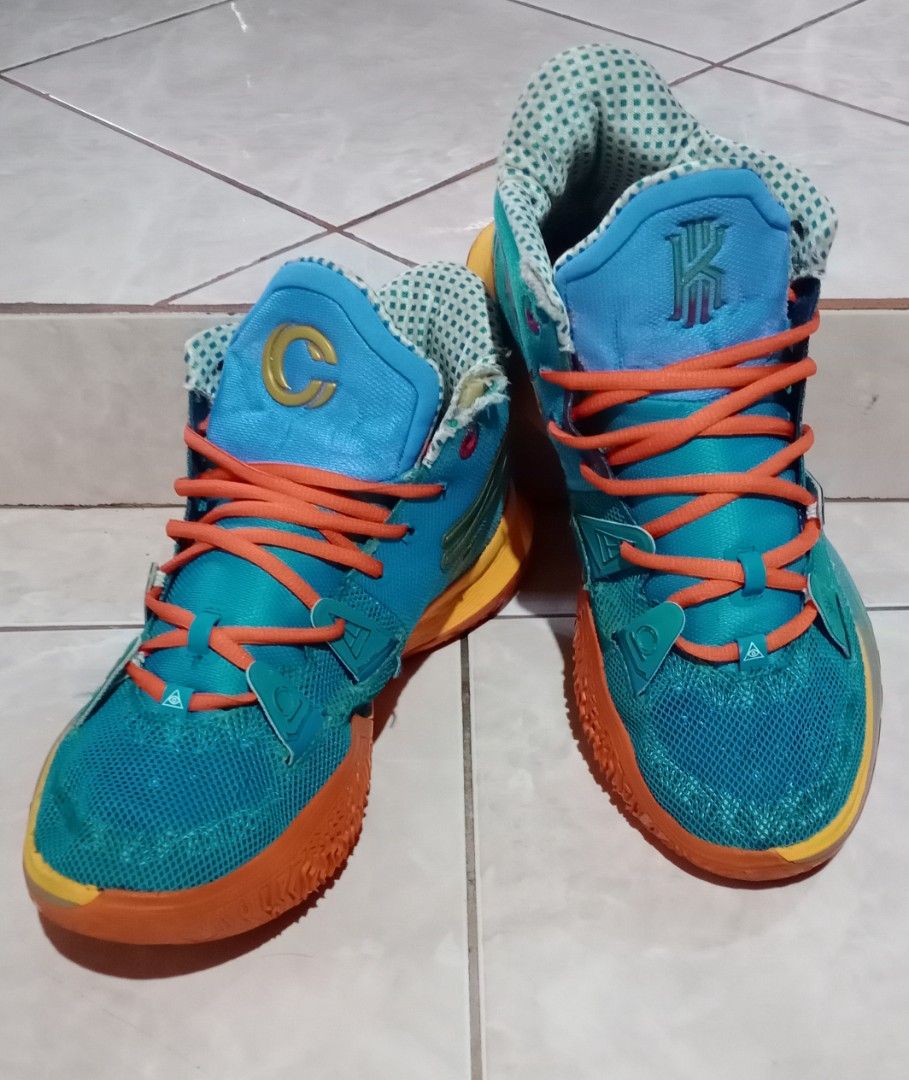 Nike Kyrie 5 Concepts (Category: Sneakers) located in Baguio. Submitted by jmlthrift27209 (Listing ID 1416085406, Image 1). Description: - Nike Kyrie 5 x Concepts - Teal and orange colorway - US size 12 - Orange laces - Mesh upper - Unique sole design - Patterned insole Issue: -Sign of Usage -Sockliner -May Kunting Dikitan MOP: Gcash.