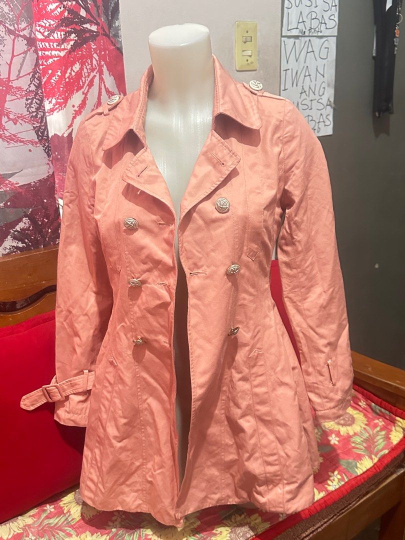 Pink Trench Coat with Silver Buttons (Category: Coats, Jackets and Outerwear) located in Quezon City. Submitted by strawberryshortcake21 (Listing ID 1416062904, Image 1). Description: - Pink trench coat - Silver buttons - Double-breasted - Classic trench coat silhouette - Belt detail on sleeves - Sophisticated and versatile.