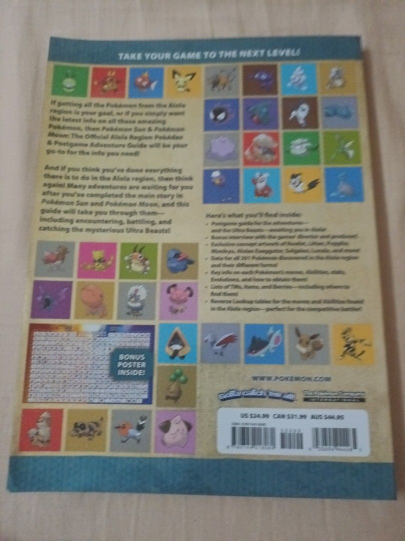 Pokemon Sun & Moon Pokedex Adventure Guide (Category: Nintendo) located in Quezon City. Submitted by limsys08 (Listing ID 1416076383, Image 2). Description: - Official Alola Region Pokedex & Postgame Adventure Guide for Pokemon Sun & Moon. - Features information on the Alola region. - Includes details on Ultra Beasts. - Lists TMs, items, and berries. - Published by The Pokemon Company International..