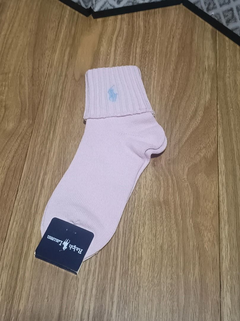 Ralph Lauren Pink Socks (Category: Socks) located in Makati City. Submitted by nyxhemera26 (Listing ID 1416207814, Image 1). Description: Authentic Ralph Lauren socks in a lovely pink color. Features the iconic polo logo and Ralph Lauren branding. The size is 22-24. Made in Japan. The tag indicates the color is "14 Old Rose". Made of cotton, nylon, and polyurethane. - no original packaging.