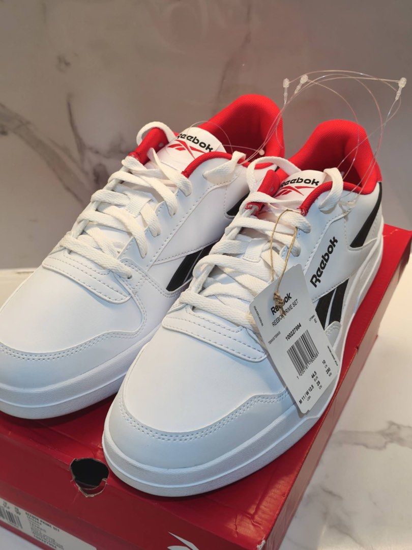 Reebok RED JUNIOR SET Sneakers (Category: Sneakers) located in Taguig. Submitted by declutterme12 (Listing ID 1416023945, Image 2). Description: - Brand new Reebok sneakers - Features red and black accents - Low-top style - Comes with the original box - Size available (check tag) - Unworn condition Meetup po pm .
