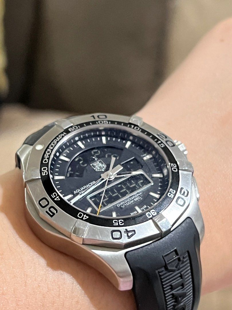 TAG Heuer Aquaracer 300M (Category: Men's Watches) located in Las Pinas. Submitted by peterjackstone (Listing ID 1416096802, Image 3). Description: Movement: Quartz Case Material: steel Aquaracer 300M Chronotimer 43 Stainless Steel / Black / Rubber Glass: Sapphire Back: Closed Shape: Round Diameter: 43.00 mm Lug Width: 21.00 mm W/R: 300.00 m NO BOX.