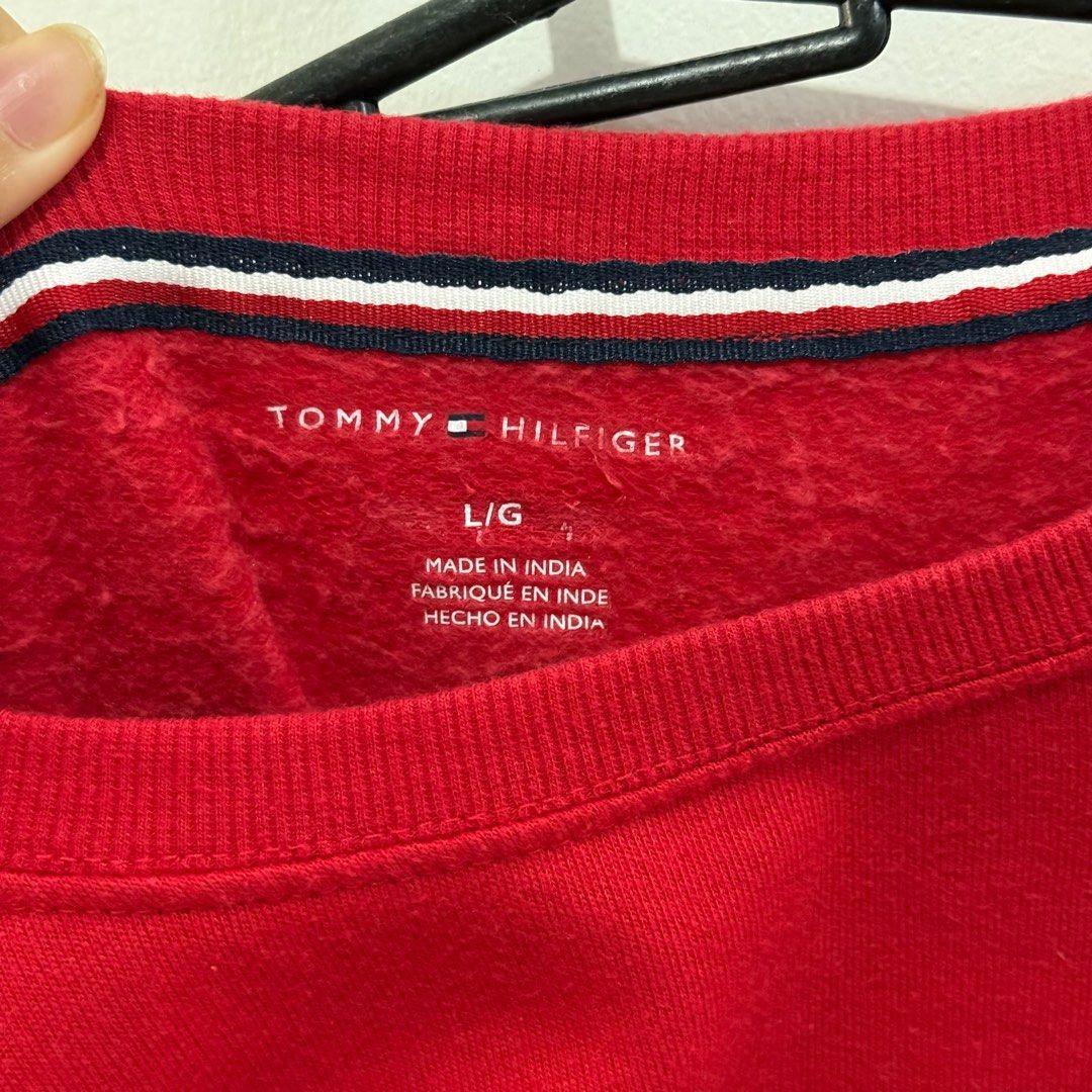 Tommy Hilfiger Red Sweatshirt L (Category: Longsleeves) located in Binan City. Submitted by ard__ (Listing ID 1416083752, Image 3). Description: - 19W 22L - Red Tommy Hilfiger sweatshirt - Size: L - Features the Tommy Hilfiger logo - Made in India - Material: 58% cotton, 42% polyester - Crew neck - Long sleeves.