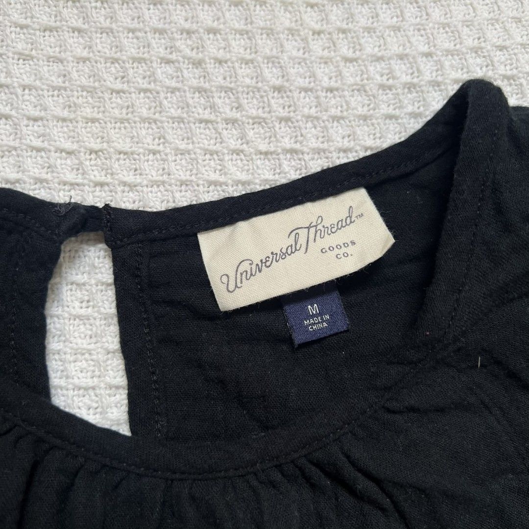 Universal Thread Black Long Sleeve Blouse✨ SUPER CLASSY AND QUALITYYY (Category: Blouses) located in Baguio. Submitted by especiallyjeans04 (Listing ID 1416152549, Image 3). Description: - Universal Thread black blouse - Size: M - Features: - Round neckline - Keyhole back detail - Puff sleeves - Slightly gathered waist - Material: 100% cotton.