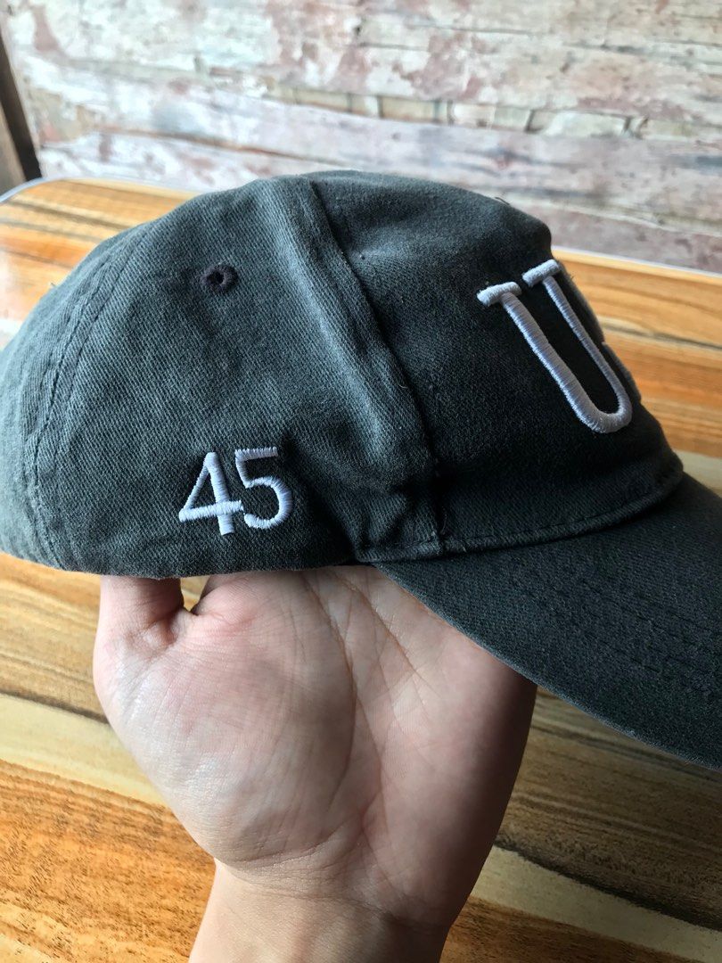 USA Trump 45 Cap (Category: Caps & Hats) located in Cebu City. Submitted by kurt.constantreader (Listing ID 1416041843, Image 2). Description: - Dark gray cap - Features "USA" embroidery on the front - "TRUMP" on the back - "45" on the side - Includes a small American flag - Made in the USA - One size fits most.