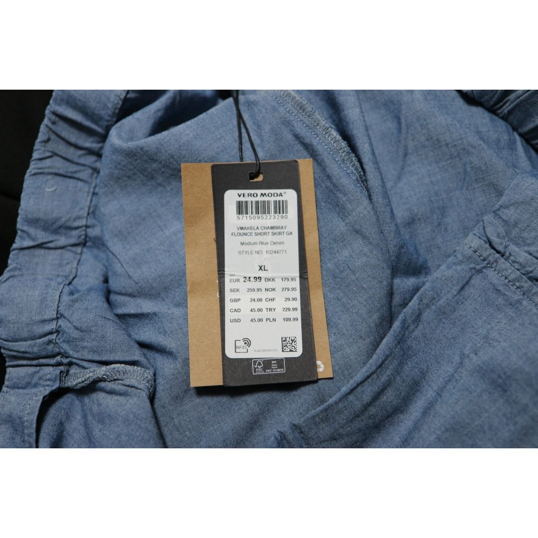 Vero Moda Denim Ruffle Skirt XL (Category: Skirts) located in Makati City. Submitted by bigboutique (Listing ID 1416188166, Image 2). Description: - Vero Moda denim skirt - Size: XL - Color: Light blue - Design: Wrap with ruffle details - Condition: New with tag.
